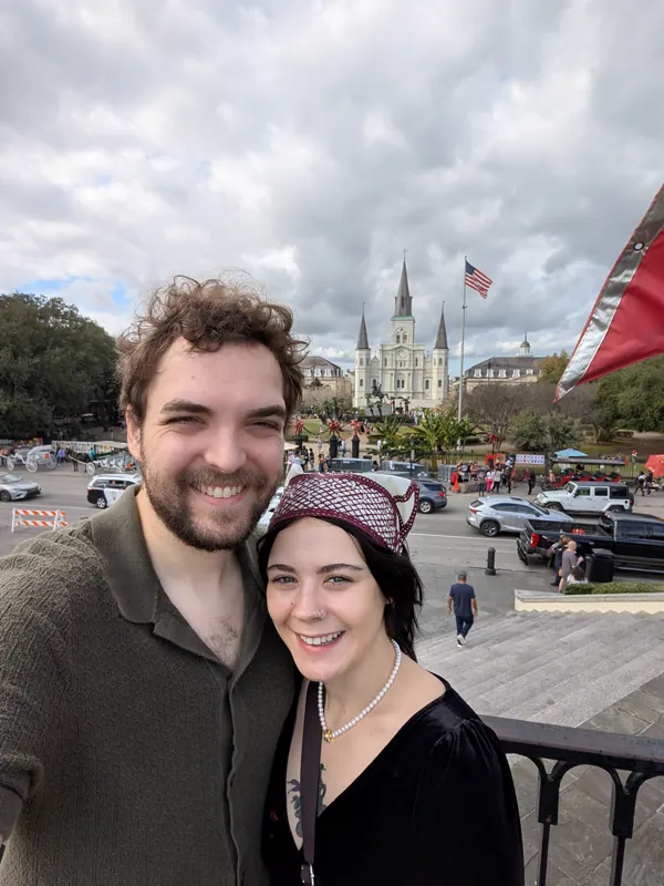 Jacob and Vicki on a balcony overlooking Jackson Square in New Orleans